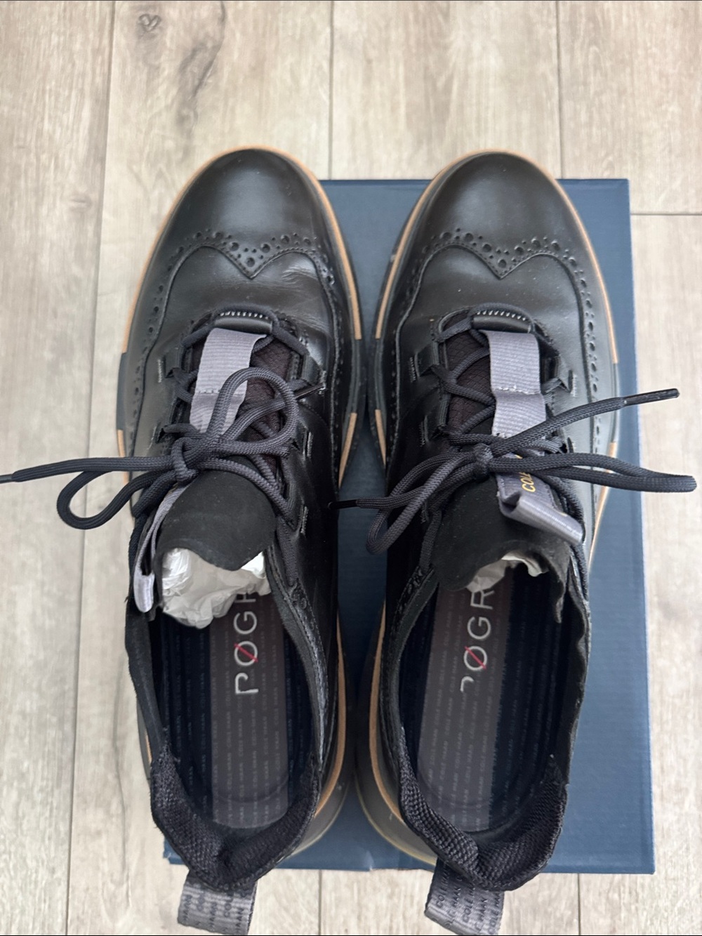 Cole Haan Black Leather Wingtip Derbys with Tan Outsole
